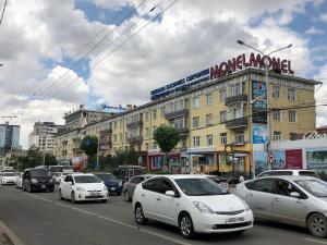a busy city street filled with lots of cars at Brilliant Location 2 in Ulaanbaatar