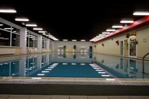 a large swimming pool in a large building at App 624 Panoramic Hohegeiß Terrassenhaus in Braunlage