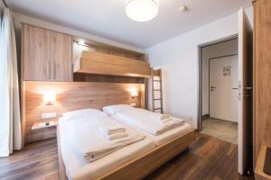 Postel nebo postele na pokoji v ubytování Apartment Bacher