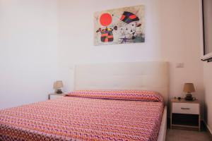 A bed or beds in a room at Milva's Apartment