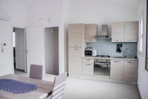 Kuchyň nebo kuchyňský kout v ubytování Milva's Apartment