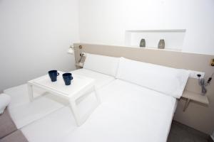 Łóżko lub łóżka w pokoju w obiekcie MONKÓ - MANGO & TROPYCAL APARTMENT o