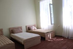 Letto o letti in una camera di GreenGate