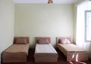 Letto o letti in una camera di GreenGate