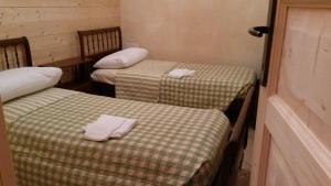 A bed or beds in a room at Laghi d'Insubria