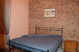 A bed or beds in a room at Laghi d'Insubria