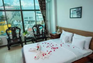 Postel nebo postele na pokoji v ubytování H79 HOTEL