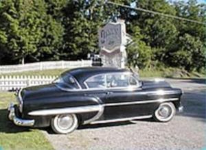 a black car parked on the side of a road at Jenny's Country Manor in Stanfordville