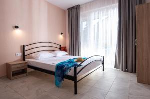 Postel nebo postele na pokoji v ubytování Persefoni Rooms Apartments & Mezonetes
