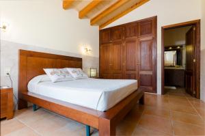 A bed or beds in a room at Es Vedat 6