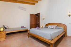 A bed or beds in a room at Es Vedat 6