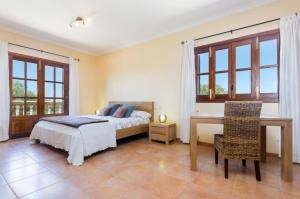 A bed or beds in a room at Es Vedat 6