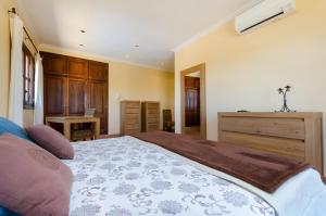 A bed or beds in a room at Es Vedat 6