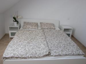 Postel nebo postele na pokoji v ubytování Apartmán U Fuxů