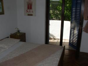 Postel nebo postele na pokoji v ubytování House Kaić