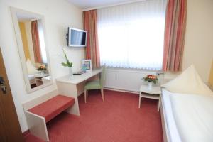 Postel nebo postele na pokoji v ubytování Hotel Reischenau