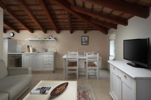 Кухня или мини-кухня в Angelo d'Oro Apartments Trevisol
