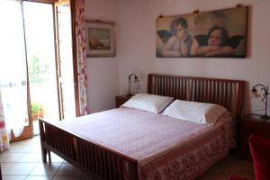 Postel nebo postele na pokoji v ubytování Bed & Breakfast Lucy