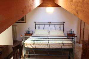 Postel nebo postele na pokoji v ubytování Bed & Breakfast Lucy