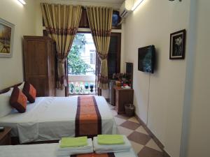 Katil atau katil-katil dalam bilik di Hanoi Ecogreen Hostel