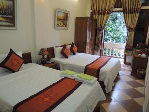 Katil atau katil-katil dalam bilik di Hanoi Ecogreen Hostel