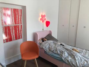 Postel nebo postele na pokoji v ubytování Rhotels