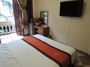 Giường trong phòng chung tại Hanoi Ecogreen Hostel