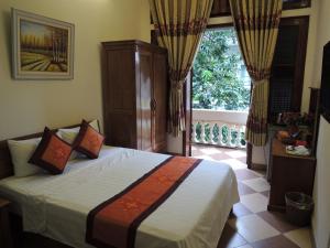 Katil atau katil-katil dalam bilik di Hanoi Ecogreen Hostel