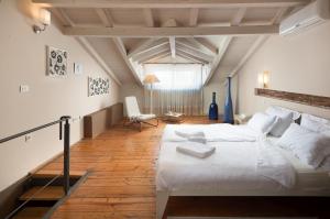 Postel nebo postele na pokoji v ubytování Angelo d'Oro Holiday Home Silva