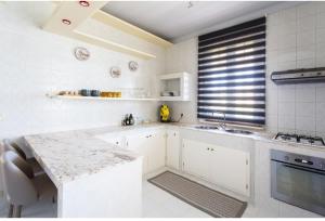 Kuchyň nebo kuchyňský kout v ubytování Casa del Sole