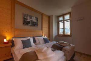 Postel nebo postele na pokoji v ubytování HOTEL AD Residence