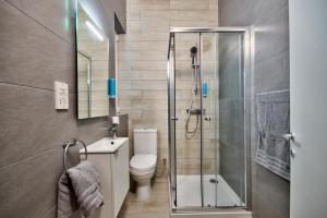 Koupelna v ubytování Cozy Rooms Hotel