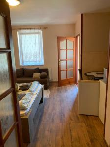 A kitchen or kitchenette at Apartmánový dom Magda