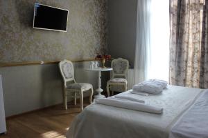 Katil atau katil-katil dalam bilik di Borjomi Classic Hotel