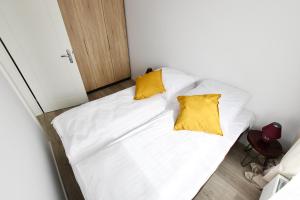 Krevet ili kreveti u jedinici u objektu Apartament Krokus 2 z garażem