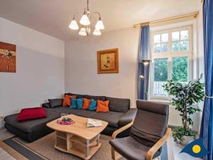 Ein Sitzbereich in der Unterkunft Villa Malve Wohnung 05