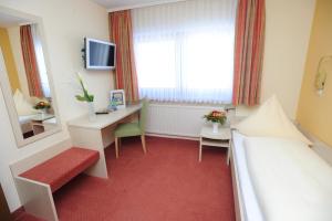 TV a/nebo společenská místnost v ubytování Hotel Reischenau