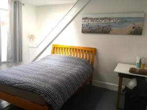 Кровать или кровати в номере Palace Surf Lodge