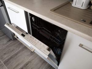 Kuchyňa alebo kuchynka v ubytovaní Golden Mazury Apartament