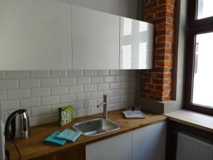 Kuchyňa alebo kuchynka v ubytovaní Good Time Aparthotel