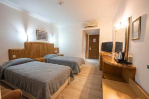 Postel nebo postele na pokoji v ubytování Belcehan Hotel + 37 fotografií