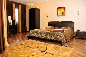 Postel nebo postele na pokoji v ubytování Totem Hotel