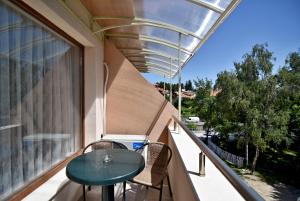 A balcony or terrace at City Apartments