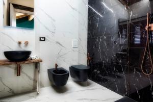 Koupelna v ubytování Palazzo Eugenia Suites