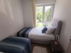 Voodi või voodid majutusasutuse Gonik Apartmani toas