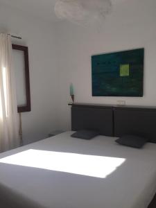 Giường trong phòng chung tại Casa Laguna ET0490