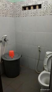 Vonios kambarys apgyvendinimo įstaigoje Homestay Omah Joyo Tugu Malioboro