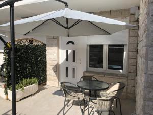 Patio nebo venkovní prostory v ubytování Apartments Amore