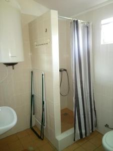Koupelna v ubytování Apartmány Denis