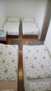 Postel nebo postele na pokoji v ubytování Apartmány Denis